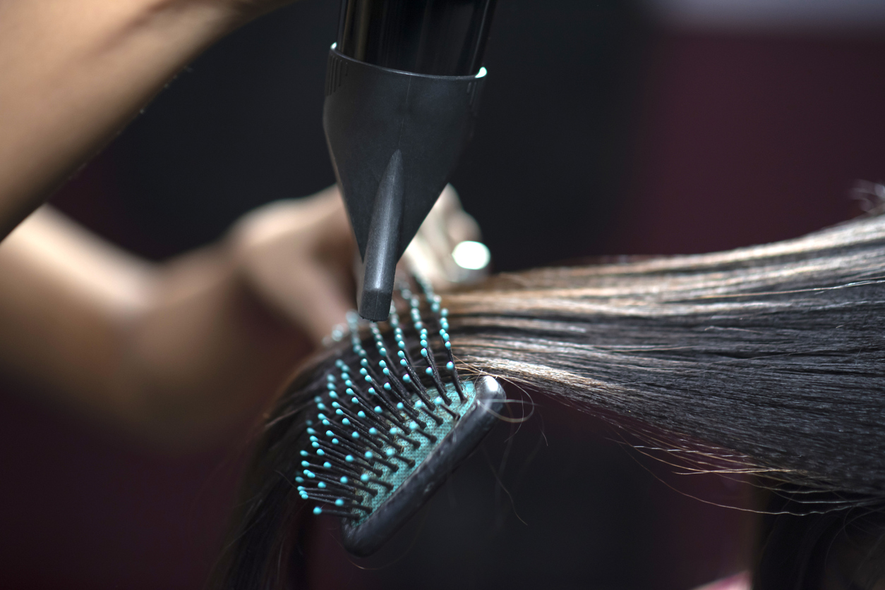 Hair being styled at a salon